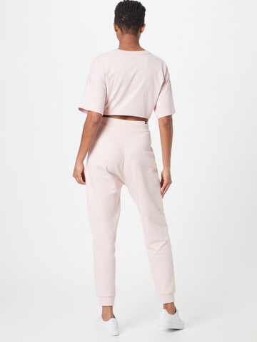PUMA Tapered Παντελόνι φόρμας 'Her' σε ροζ