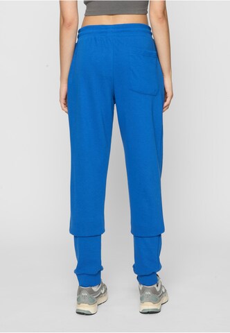 Tapered Pantaloni di Urban Classics in blu