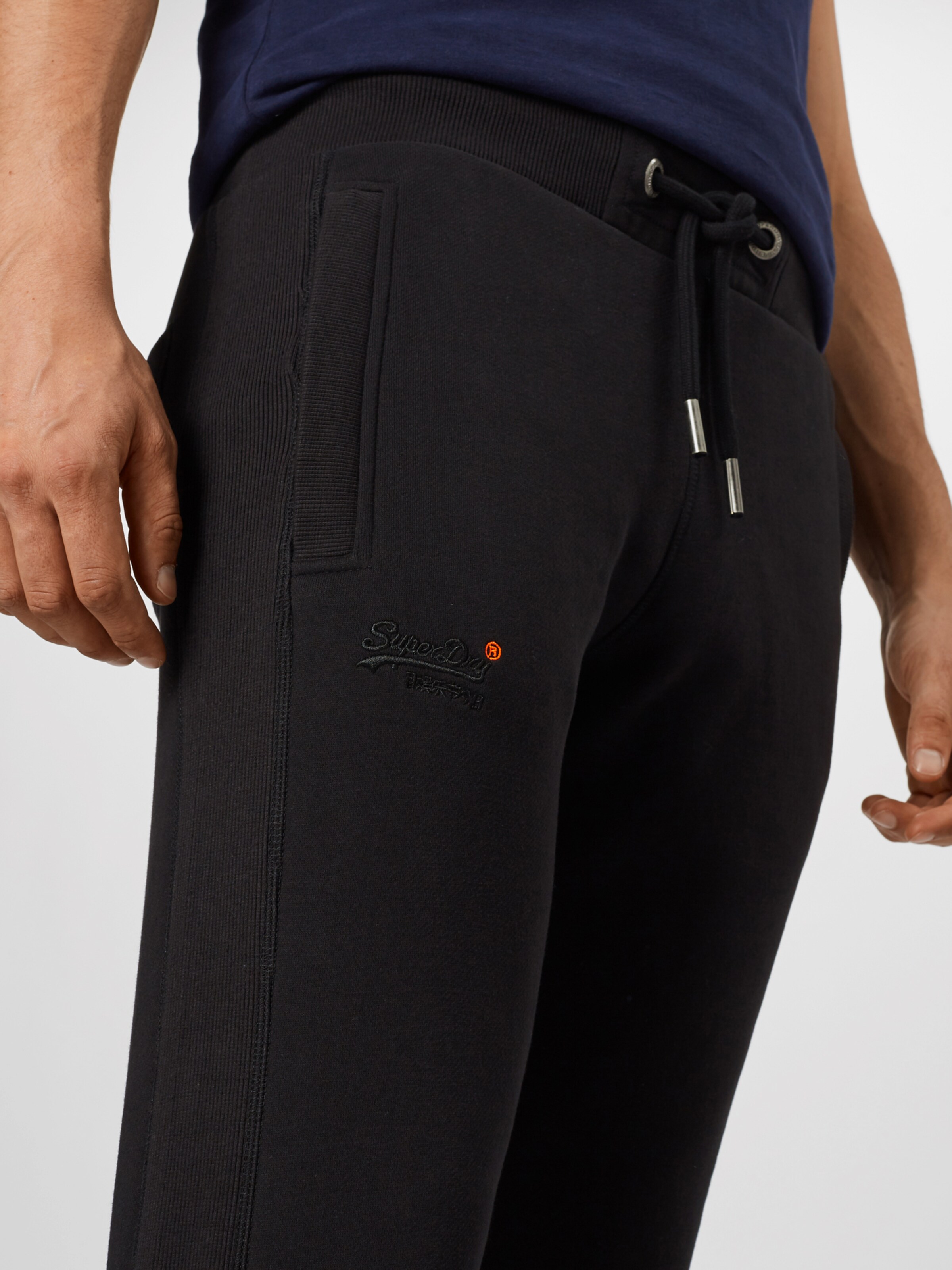 Männer Sweat Superdry Hose in Schwarz - XQ20184 Männer Sweat Superdry Hose in Schwarz - XQ20184