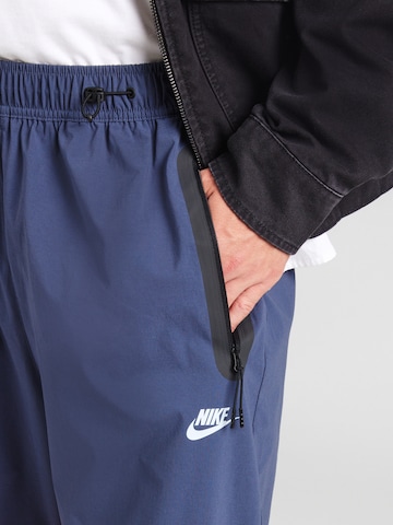 Nike Sportswear Конический (Tapered) Штаны 'Tech' в Синий