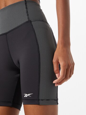 Skinny Pantaloni sportivi di Reebok in nero