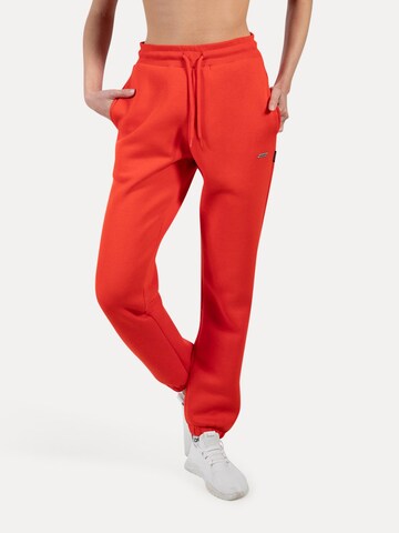 Effilé Pantalon Smilodox en orange : devant