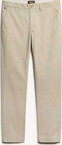 Coupe slim Pantalon chino Superdry en beige : devant