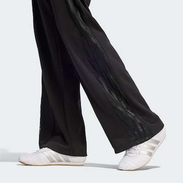 Loosefit Pantaloni sportivi 'Firebird' di ADIDAS ORIGINALS in nero
