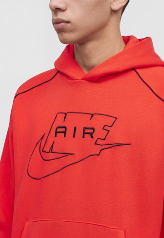 Sweat-shirt 'AIR' Nike Sportswear en rouge