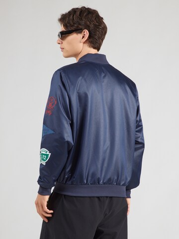 Nike Sportswear Tussenjas 'CLUB VARSITY' in Blauw