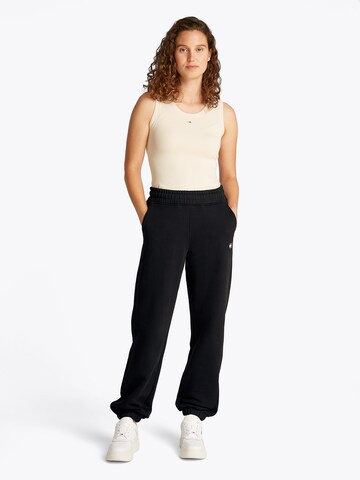 Tapered Pantaloni di Tommy Jeans in nero