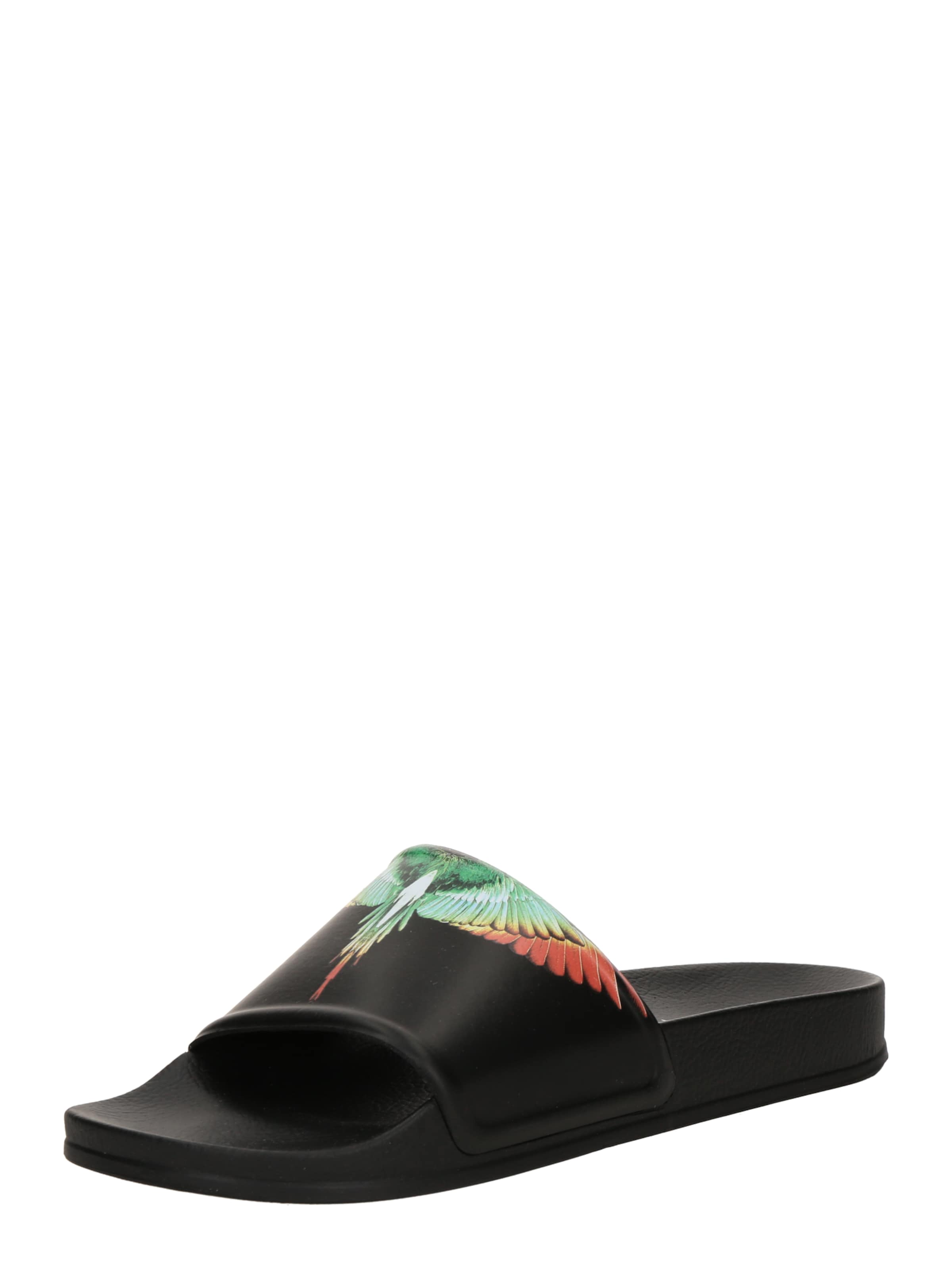 Marcelo Burlon Mules 'ICON WINGS' in Black: front