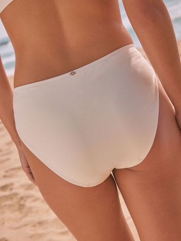 Next Bikinihousut värissä beige