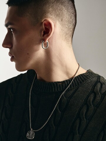 Orecchino 'SHAKEL' di REYTEL in argento