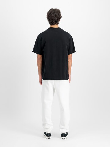 Effilé Pantalon ALPHA INDUSTRIES en blanc