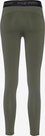 NIKE Skinny Workout Pants in Green