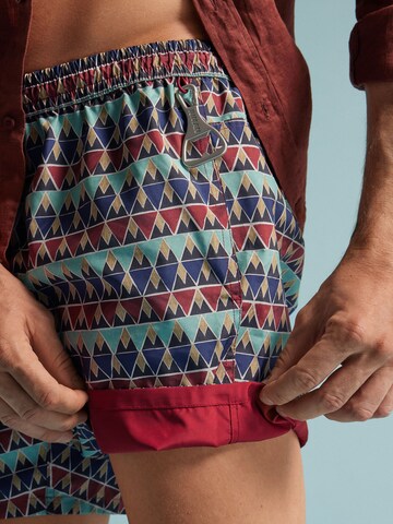 IUMAN Intimissimi Board Shorts in Red