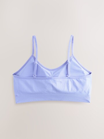 Haut Next en bleu