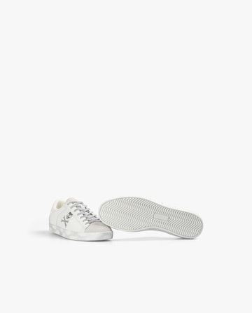 Baskets basses 'Schenry' Scalpers en blanc