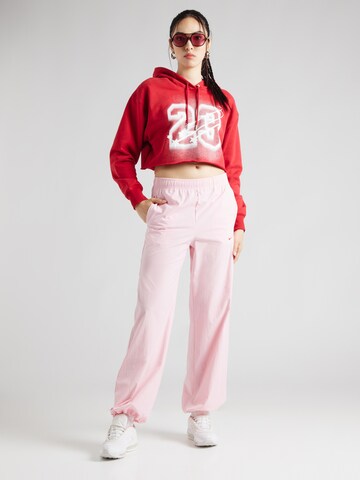 Nike Sportswear Tapered Hose in Pink