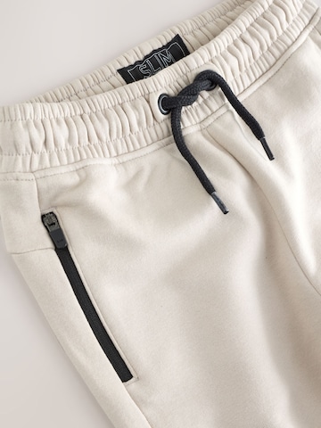 Next Tapered Hose in Grau