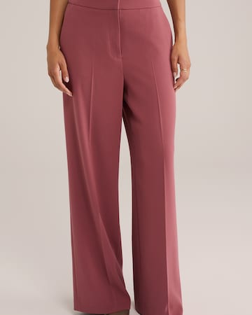 Loosefit Pantaloni con piega frontale di WE Fashion in rosa: frontale