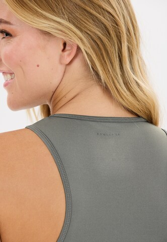 Athlecia Sports top 'Almi V2' in Green