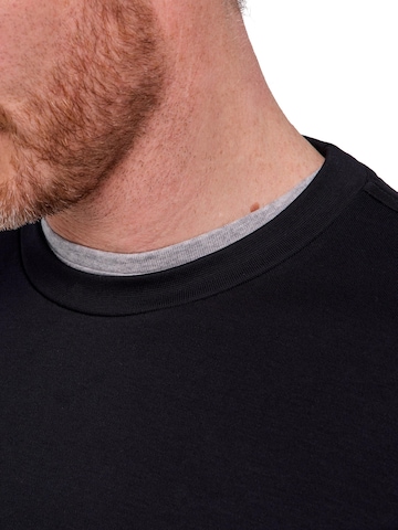FALKE Sweatshirt 'Essential'‌‌‌ in Schwarz