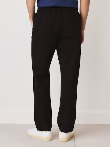 melns Next Standarta Bikses