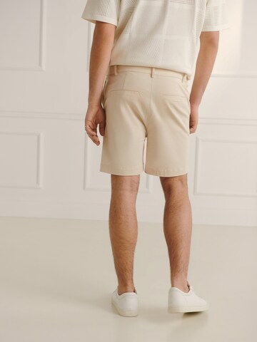 Guido Maria Kretschmer Men Regular Trousers 'Jonas' in Beige