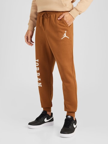 Jordan Tapered Trousers 'ESS' in Brown: front