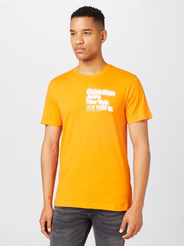 Calvin Klein Jeans - Camiseta en naranja: frente