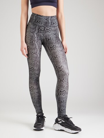 Skinny Pantalon de sport 'Id Train' Reebok en noir : devant