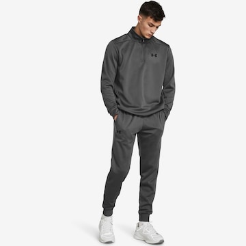 UNDER ARMOUR Tapered Sporthose in Grau