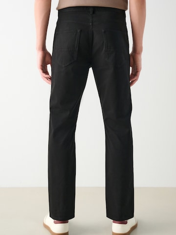 Next Slimfit Spodnie w kolorze czarny
