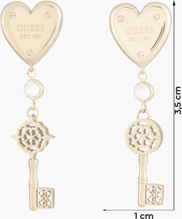 GUESS - Pendientes en amarillo