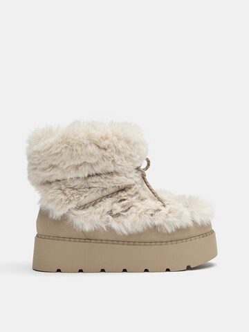 Bocanci de zăpadă de la Pull&Bear pe bej