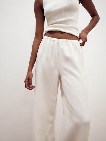 ABOUT YOU x Marie von Behrens Wide leg Trousers 'Paula' in White