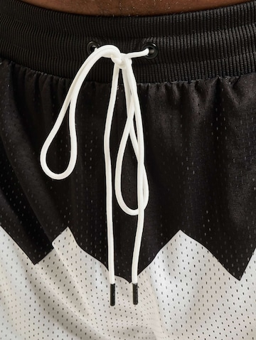 Loosefit Pantaloni sportivi 'Scholarship' di PUMA in nero