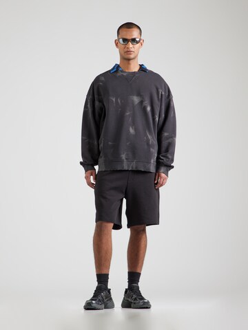 HUGO Sweatshirt 'Nustroyos' in Schwarz