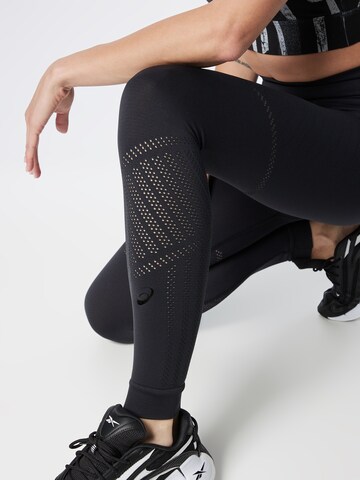 Skinny Pantalon de sport ASICS en noir