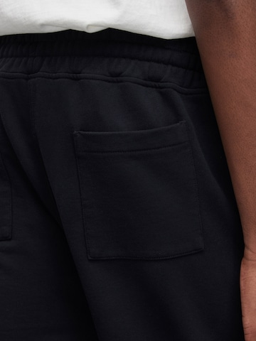 Regular Pantaloni 'UNDERGROUND' de la AllSaints pe negru