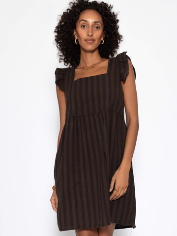 SASSYCLASSY Dress in Brown: front