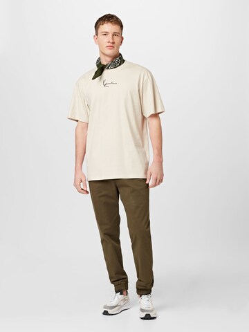 Karl Kani T-Shirt ' Small Signature Essential T' in Beige