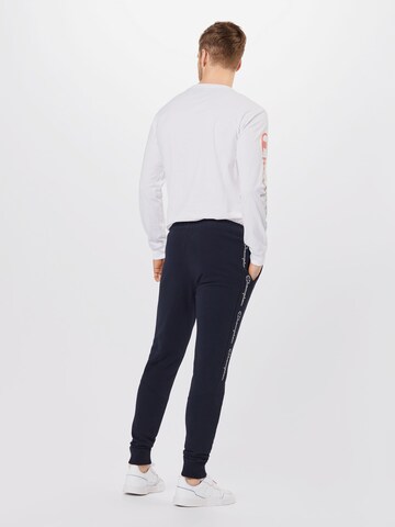 Champion Authentic Athletic Apparel Tapered Trousers in Blue