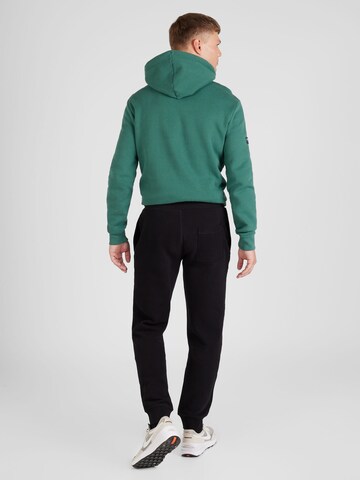 Superdry Tapered Broek 'Essential' in Zwart