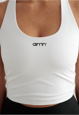 Bustino Reggiseno sportivo 'Essential' di Aim'n in bianco