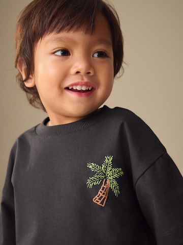 Next Sada – šedá