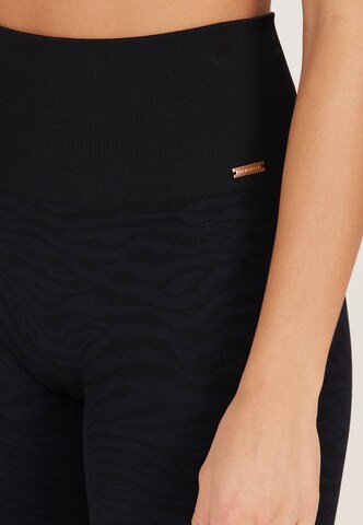 Athlecia - Skinny Pantalón deportivo 'Empower' en negro