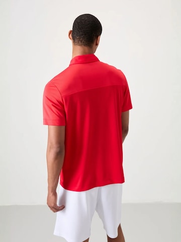 T-Shirt fonctionnel Tommy Life en rouge