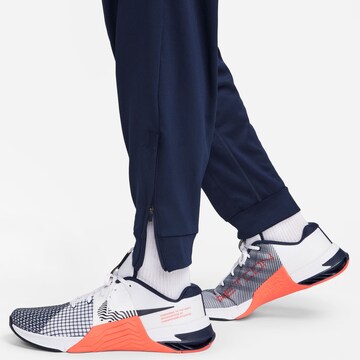 NIKE Regular Sportbroek 'TOTALITY' in Blauw