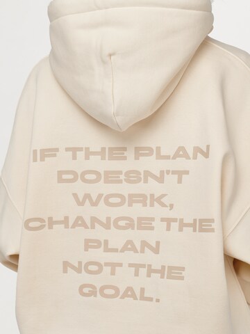 ABOUT YOU x VIAM Studio Hoodie 'Better' in Beige