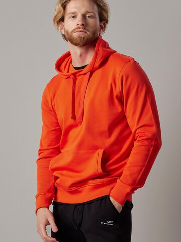 OWN Off With Nature Sweatshirt 'Felpa con Cappuccio' in Orange: front