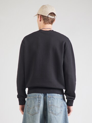 Carhartt WIP Свитшот 'Alumni' в Черный